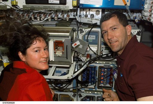 Clark and Husband in the Spacehab RDM during activation procedures on STS-107