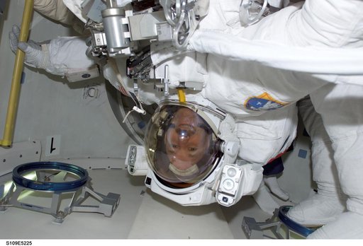 STS-109 MS Grunsfeld  in airlock prior to EVA
