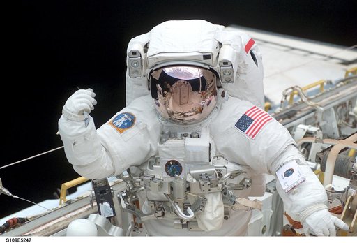 STS-109 MS Grunsfeld in payload bay during first EVA