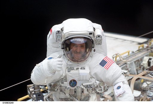 STS-109 MS Grunsfeld in payload bay during first EVA