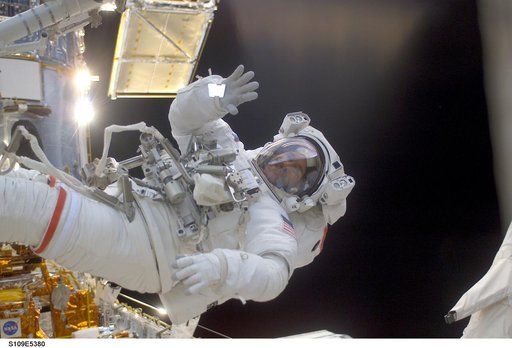 STS-109 MS Grunsfeld during  third EVA
