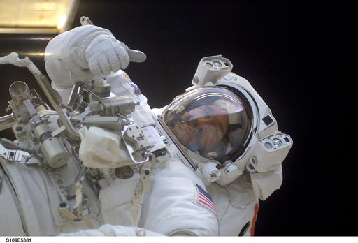STS-109 MS Grunsfeld during  third EVA