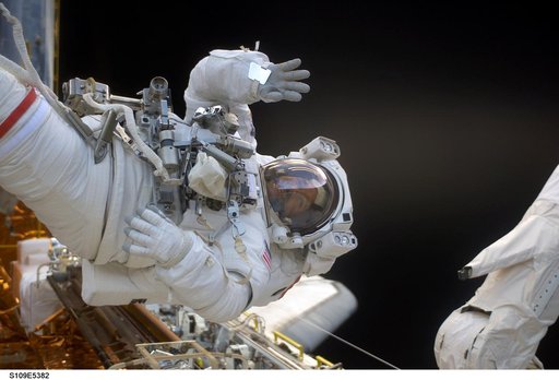 STS-109 MS Grunsfeld during  third EVA