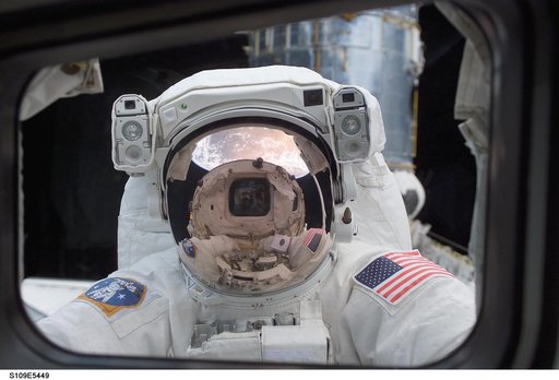 View of STS-109 MS Grunsfeld during EVA 1