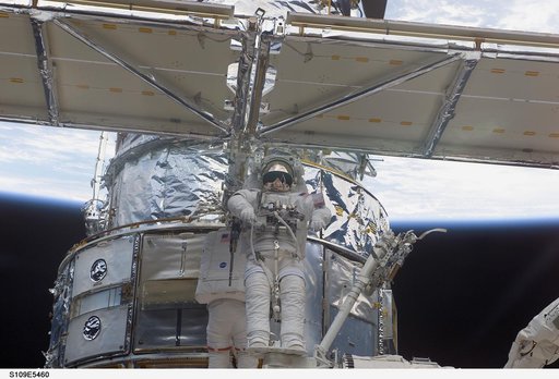 View of STS-109 MS Linnehan and Grunsfeld during EVA 1