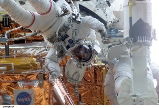 EVA 5 - MS Grunsfeld and Linnehan preparing for NICMOS installation