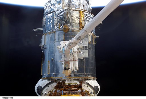 EVA 2 - MS Newman and Massimino on HST