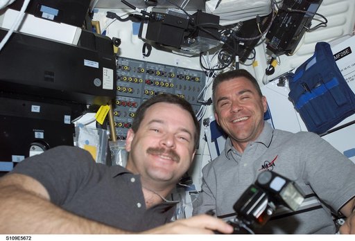 CDR Altman and PLT Carey in airlock