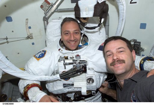 CDR Altman and MS Massimino in airlock prior to  EVA 4