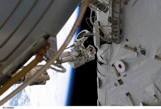 Chang-Diaz holds PDGF for installation on the ISS P6 truss during STS-111 UF-2 EVA 1