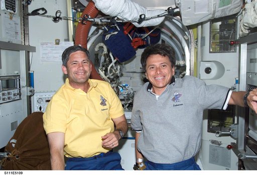Lockhart and Chang-Diaz pose in the Quest A/L during STS-111 UF-2 docked OPS