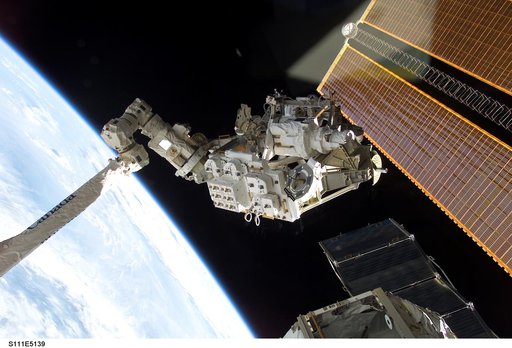 MBS grappled to the Canadarm2 SSRMS during STS-111 UF-2 installation OPS on the ISS truss structure