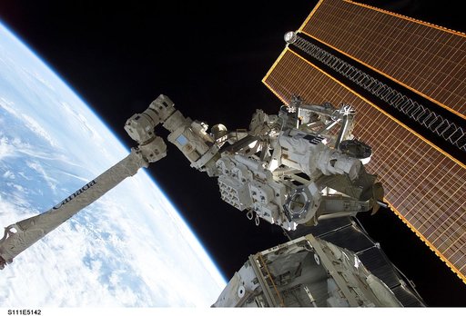 MBS grappled to the Canadarm2 SSRMS during STS-111 UF-2 installation OPS on the ISS truss structure