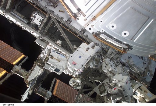 Chang-Diaz and Perrin work at the MBS on the S0 (S-zero) truss during STS-111 UF-2 EVA 2
