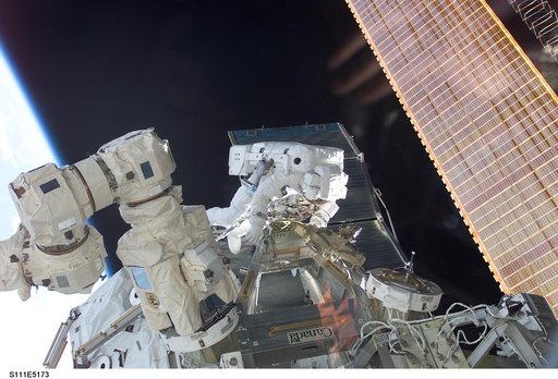 Perrin works at the MBS on the S0 (S-zero) truss during STS-111 UF-2 EVA 2