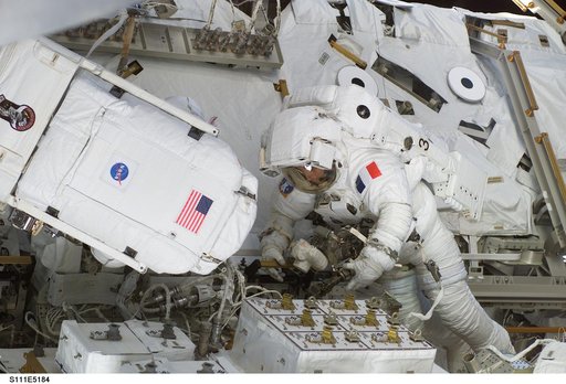 Chang-Diaz and Perrin attach power and data cables to MBS during STS-111 UF-2 EVA 2