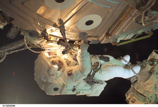MS Sellers connects cables during EVA 2