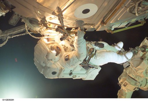 MS Sellers connects cables during EVA 2
