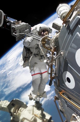 MS Wolf installs exterior station camera during EVA 2