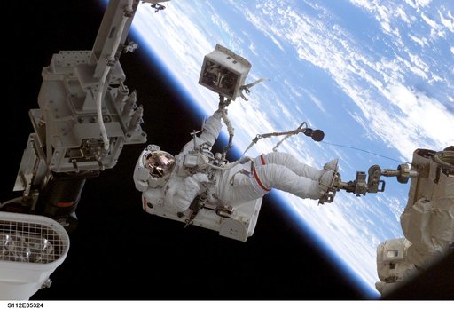 MS Wolf with portable toolbox during EVA 2