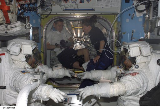 MS Wolf and MS Sellers in Quest airlock for EVA 3