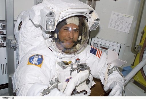 EVA Prep OPS - MS Herrington donned in EMU for first EVA during STS-113