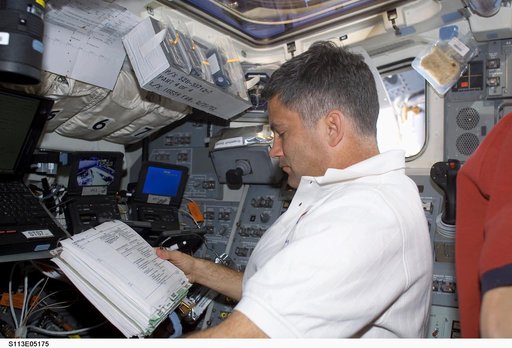 PLT Paul Lockhart working on the AFD during EVA2 docked ISS OPS for STS-113