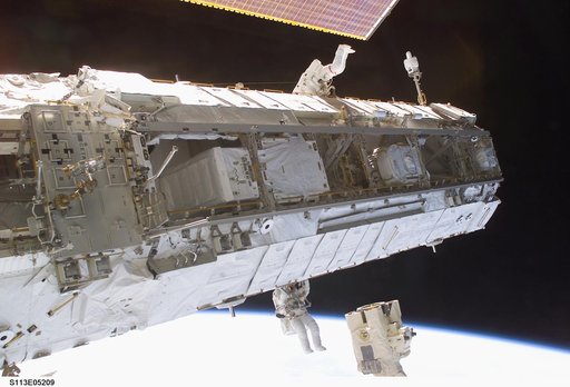 MS Herrington and Lopez-Alegria during the second EVA for STS-113