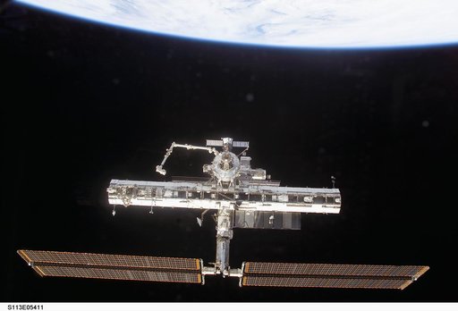 Forward view of the ISS taken during flyaround operations following STS-113 undocking