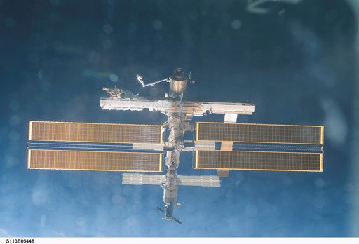 Overall exterior views of the ISS during Undocking and Flyaround Operations for STS-113 (11A)