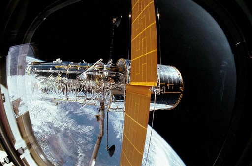 STS-31 Hubble Space Telescope (HST) appendage deploy aboard OV-103