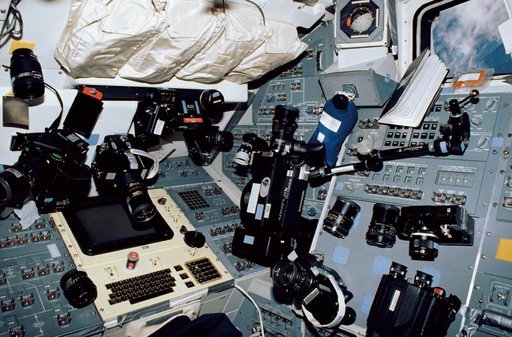 STS-35 aft flight deck of Columbia, OV-102, with an array of camera equipment