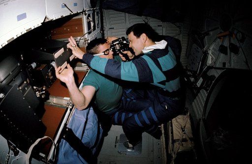 STS-41 crewmembers conduct DSO 0474 Retinal Photography on OV-103's middeck