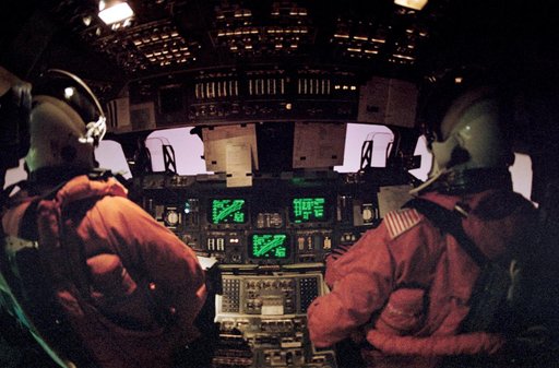 STS-42 Commander Grabe and Pilot Oswald at OV-103's controls during reentry