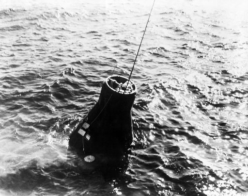 Mercury-Atlas 6 "Friendship 7" spacecraft is retrieved from the Atlantic Ocean