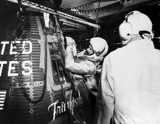 View of Astronaut John Glenn insertion into the Mercury Spacecraft