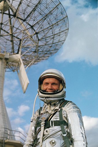 Astronaut John Glenn poses for press photographers at Cape Canaveral