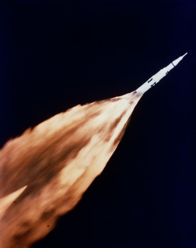 F-1 engines of Apollo/Saturn V first stage leave trail of flame after liftoff