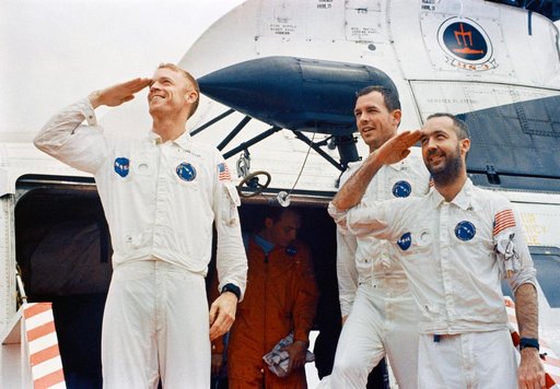 Apollo 9 crewmen arrive aboard U.S.S. Guadelcanal