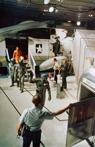Apollo 11 crewmen arrive aboard U.S.S. Hornet during recovery operation