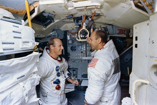 Apollo 12 crewmembers shown in Apollo Lunar Module Mission Simulator