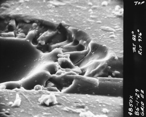 Enlarged view of hypervelocity impact of lunar surface material