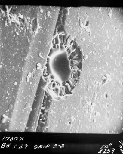 Enlarged view of hypervelocity impact of lunar surface material