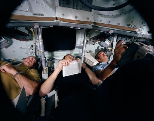 View of Apollo 14 crewmen in Command Module simulation training