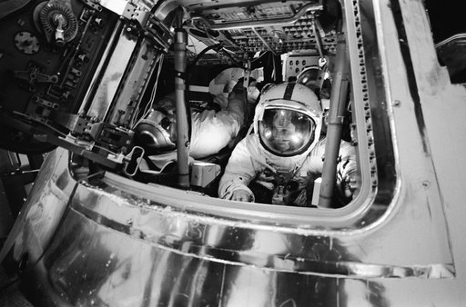 Apollo 16 astronauts in Apollo Command Module Mission Simulator