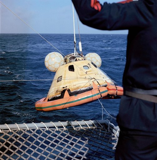 Skylab 3 Command Module is hoisted aboard prime recovery ship