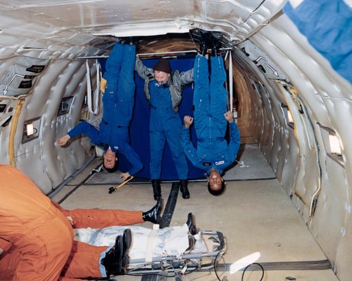 Astronaut Guion S. Bluford and others participate in zero-g studies