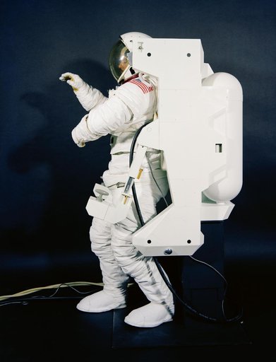Crewman in high-fidelity EMU/MMU mockup