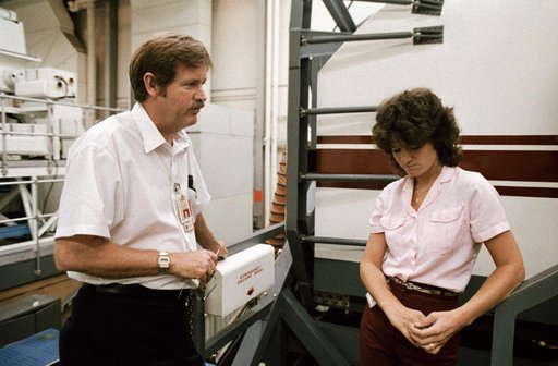 Astronaut Sally K. Ride outside of shuttle mission simulator