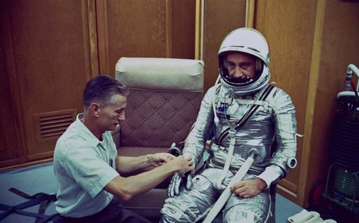 Astronaut Grissom dons spacesuit for Mercury-Redstone 4 mission